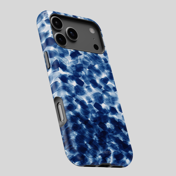 Phone case with blue abstract pattern on a gray background