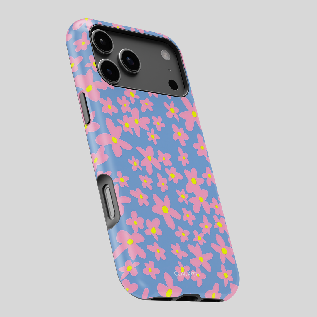 Phone case with pink floral pattern on a blue background