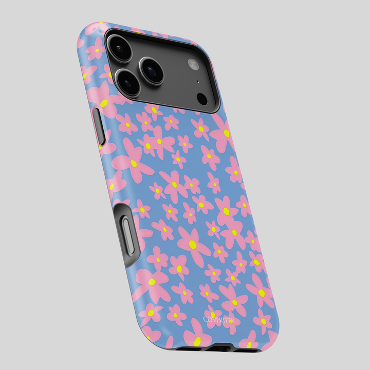 Phone case with pink floral pattern on a blue background