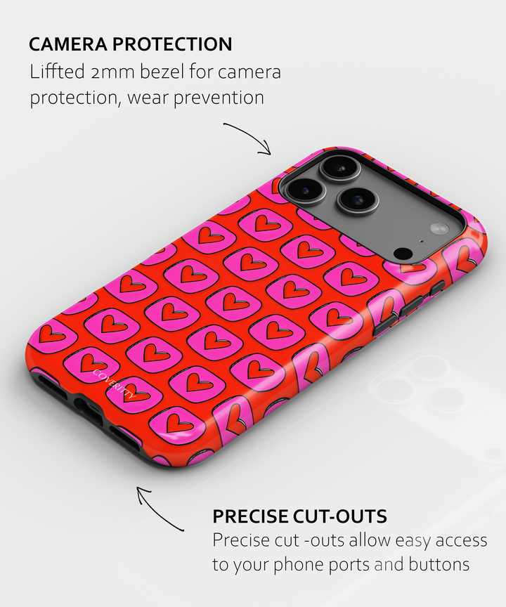 Phone case with heart pattern and camera protection features on a white background