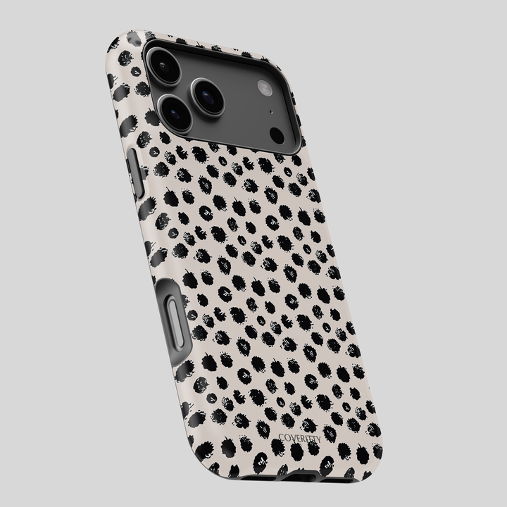 Phone case with black leopard print pattern on a light gray background