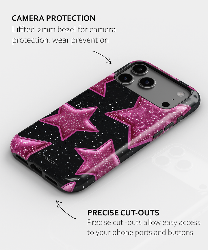 Phone case with pink stars on a black background, featuring text about camera protection and cut-outs.