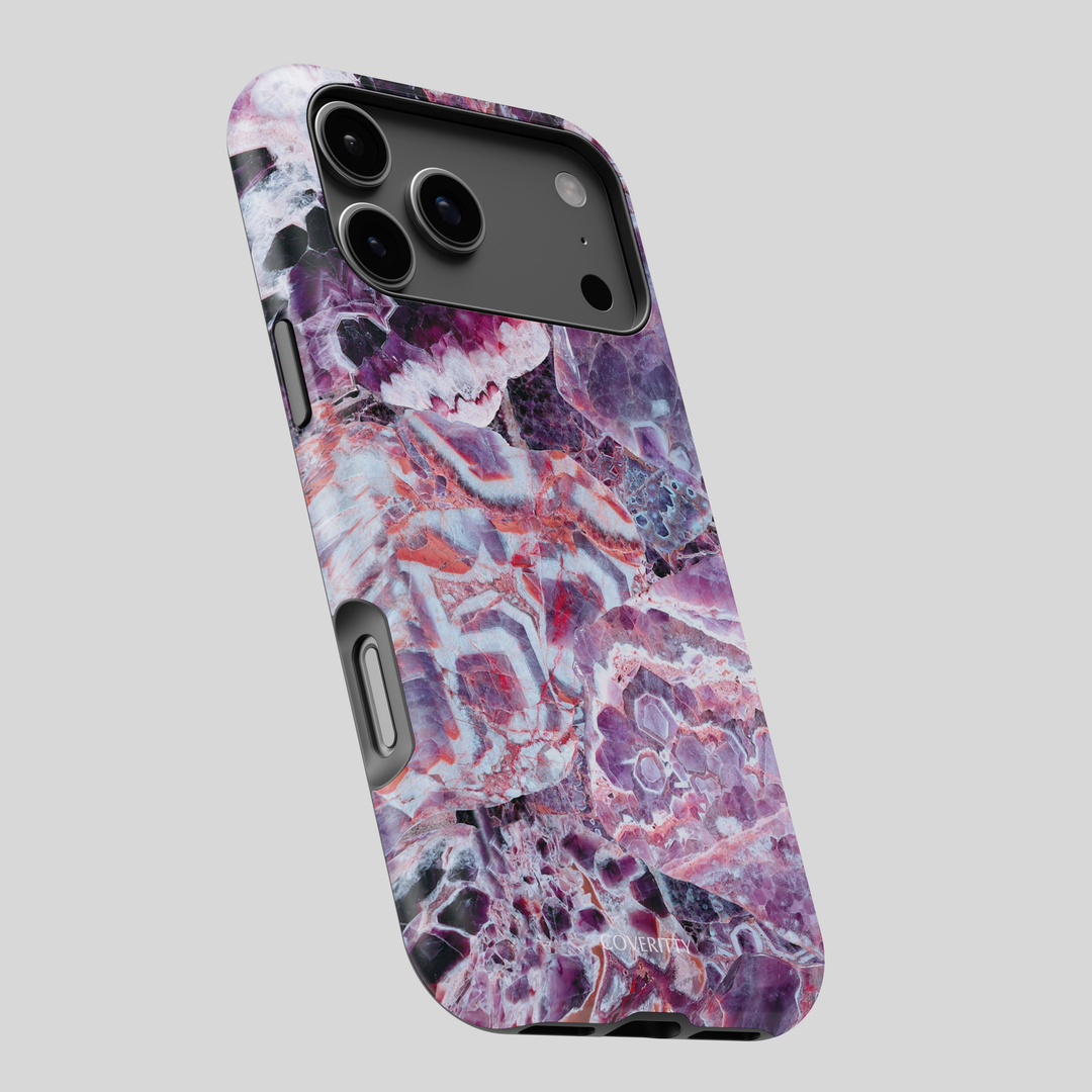 Phone case with a purple and pink marbled design on a light gray background