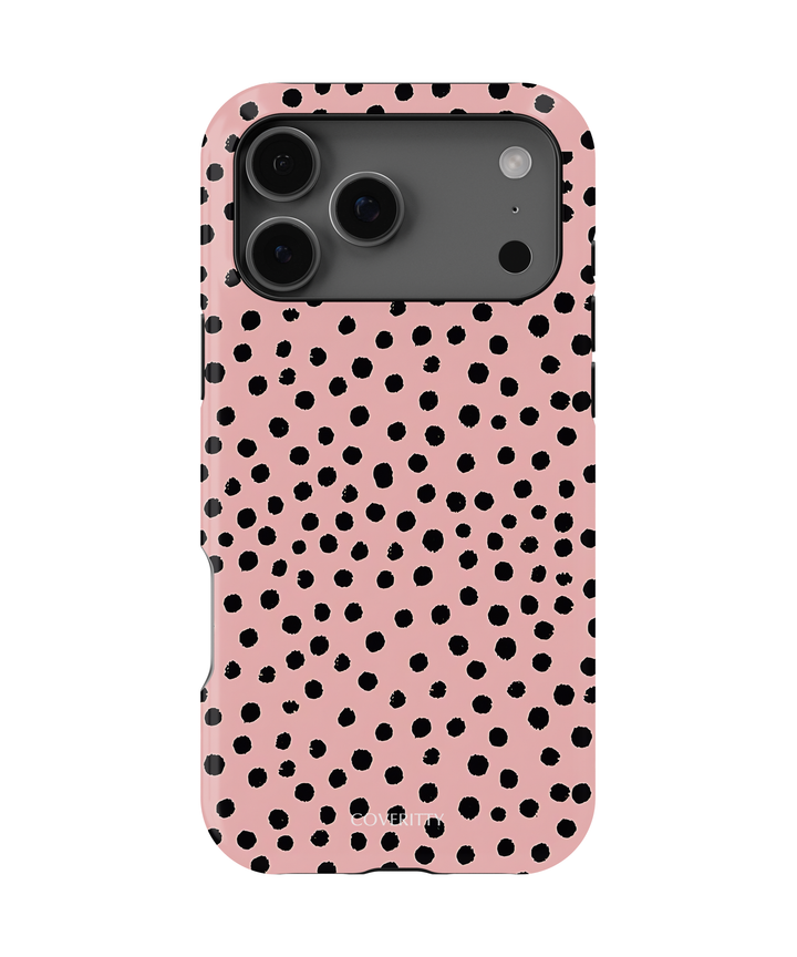 Pink phone case with black irregular polka dots called Soft Chaos